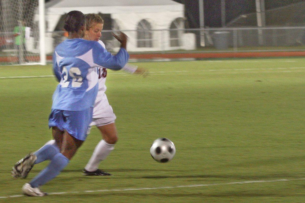 Senior forward Lindsay Vera dribbles past a would-be defender.
