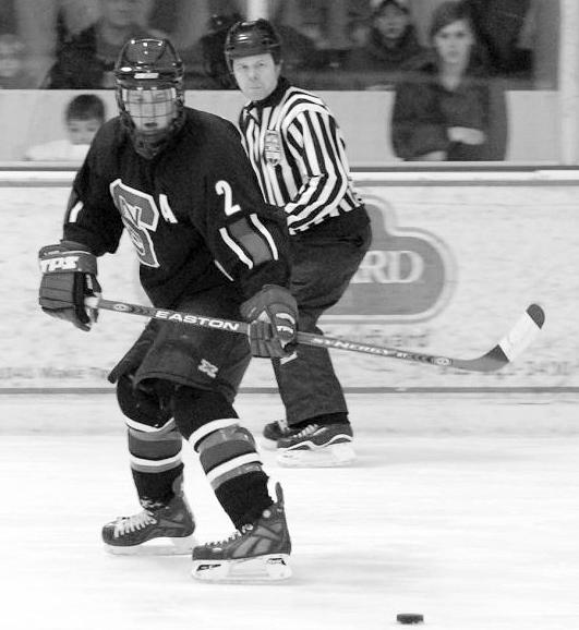 Captain Wes White skates down the rink in February
