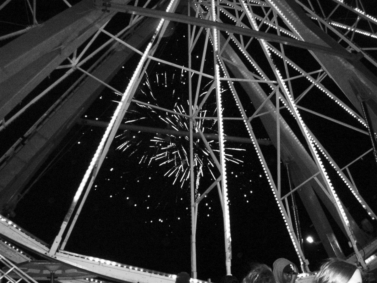 A picture of the fireworks underneath the Ferris Wheel on Oct. 18 (Photo by