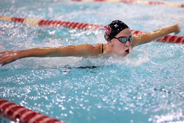 Senior swimmer Anna Linkenauger competes in the 200 yard butterfly during the Red and White Scrimmage in the Casey Natatorium Oct. 3, 2008. Photo by Chris Sanchez