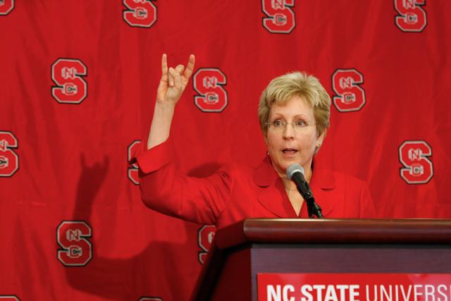 Debbie Yow tries the iconic wolf-ears at her press conference Friday, June 25, 2010. She replaces the previous athletic director Lee Fowler July 15.