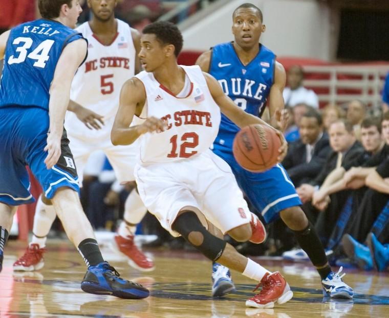 Freshman Ryan Harrow drives the ball against Duke's Ryan Kelly and Nolan Smith in the first half Wednesday at the RBC Center. Harrow finished with 15 points and five assists as the Wolfpack fell to the Blue Devils, 78-92.
