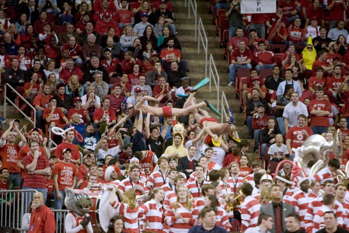 Redshirt junior Greg Baskwell and senior Nick Schauer 'air swim' at the men's basketball game vs. Duke.