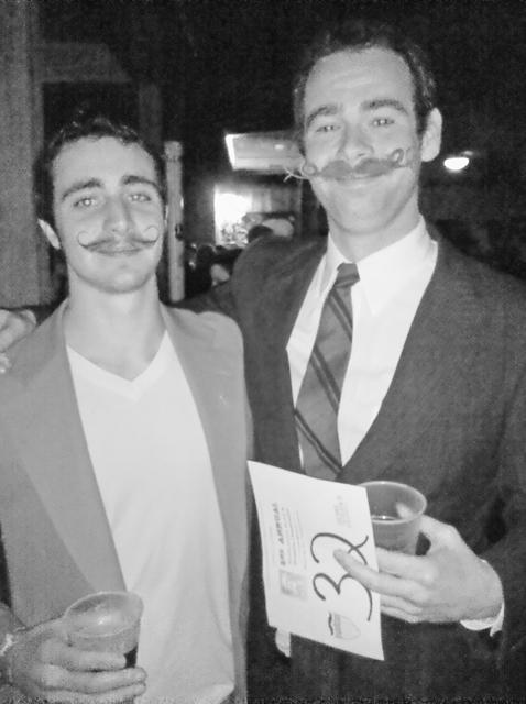 Josh Fox, left, poses with his award winning beard.