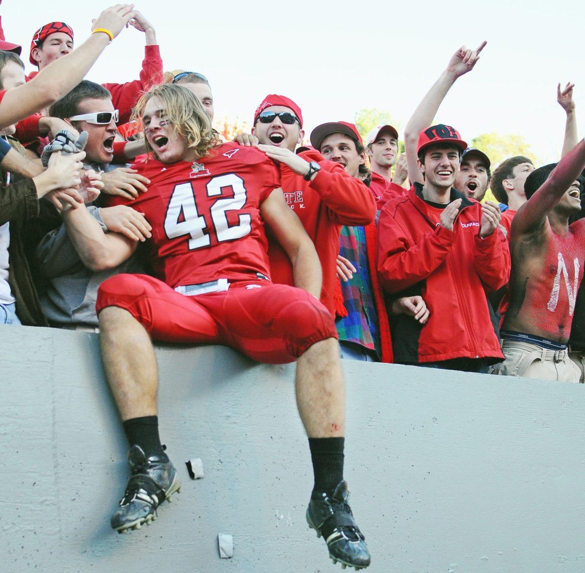Redshirt junior Audie Cole jumps into the stands following a 28-27 victory over North Carolina in 2009. After recording 97 tackles a season ago, Cole has been using spring practice to get accustomed to the middle linebacker position, filling the void left by Nate Irving.