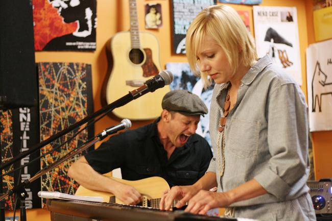 Ivan Howard and Kelly Crisp, band members of The Rosebuds, perform a song off of their new album, "Loud Plane Fly Low," at Schoolkids Records June 7. The band kicked off their tour with Bon Iver June 10.