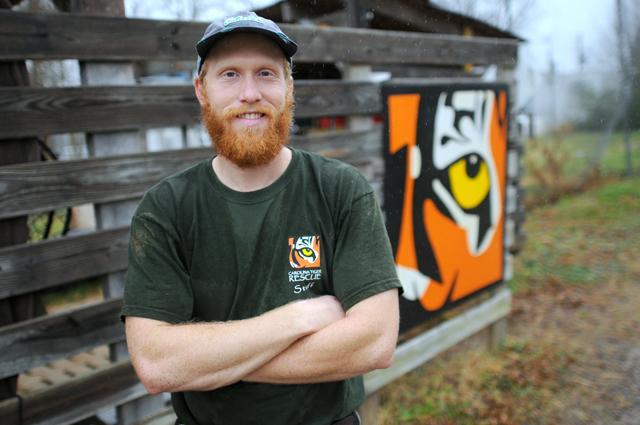 Ed Davis, an alum of NC State, works at the North Carolina Tiger Rescue, located in Pittsboro, NC. He was hired earlier this year and plans on working at the facility for at least a couple of years. Photo by Jordan Moore
