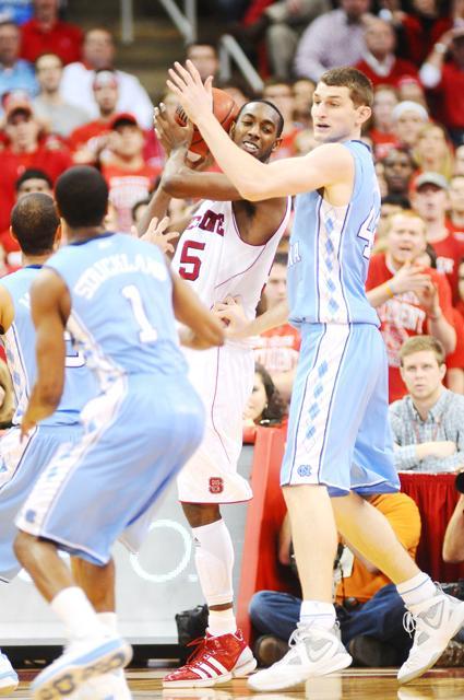 Sophomore forward C.J. Leslie is defended by North Carolina foward Tyler Zeller on Feb. 23
