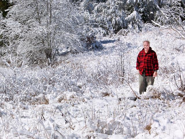 John Wooding has done research all across the east coast. In this photo Wooding was setting rabbit traps and marking them with red tags on trees. No rabbits were harmed. Photo courtesy of John Wooding