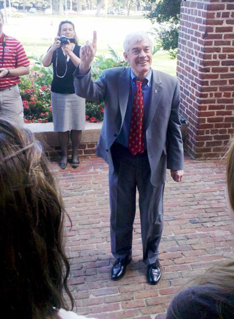 Tom Stafford, vice chancellor for Student Affairs, reacts to the surprise announcement of the renaming of the Wolfpack Student Initiative. Student Government officers held up signs announcing the change of the name of the scholarship before the start of a Memorial Bell Tower tour, Wednesday, March 8, 2012. The scholarship was renamed the Stafford Student Leadership Scholarship, awarded to students with financial need who are involved in a campus organization. Photo by Laura Wilkinson