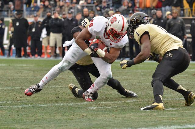 Redshirt sophomore running back Tony Creecy gets tackled on an rushing attempt against Vanderbilt in the Music City Bowl.