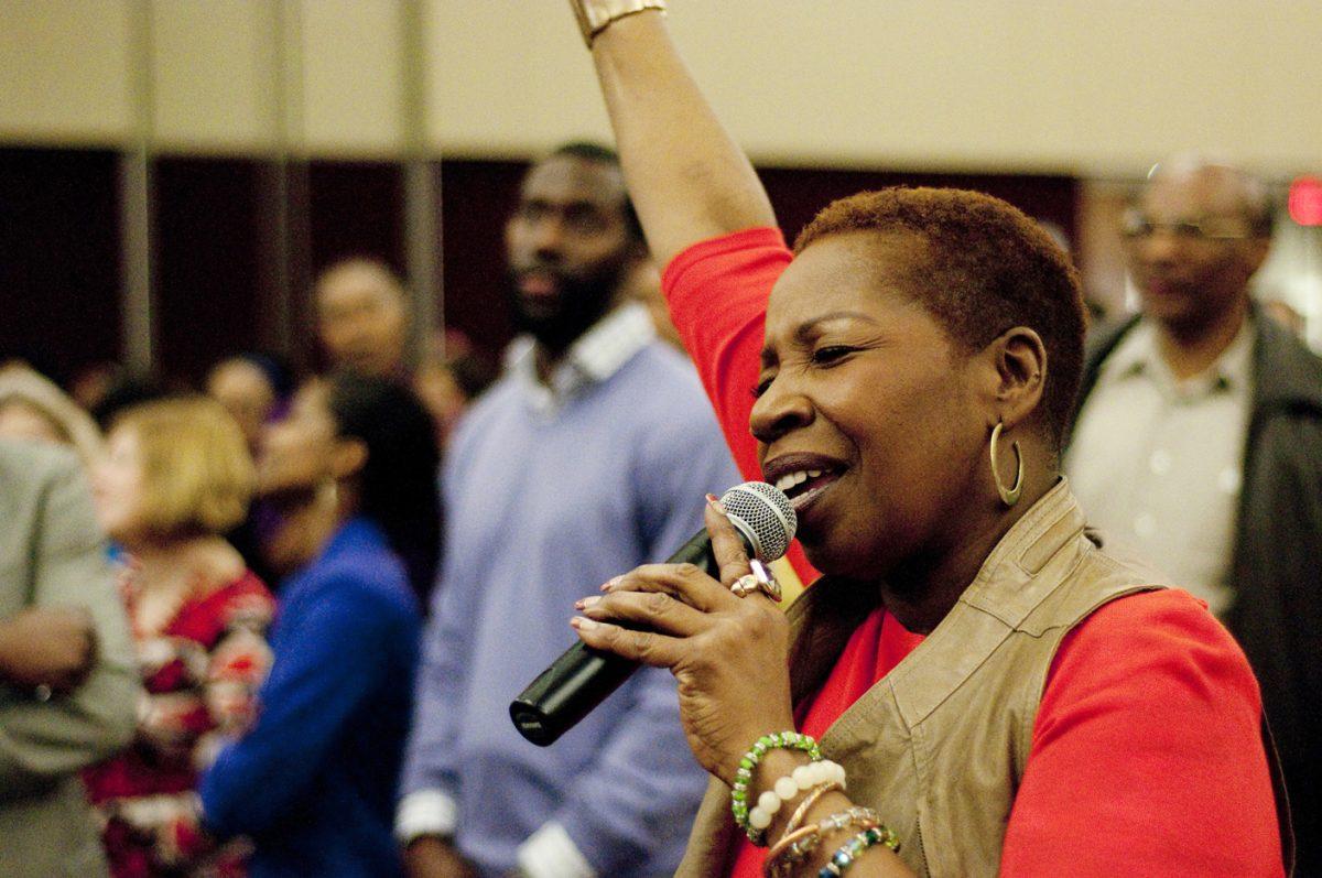 Iyanla Vanzant, author of multiple The New York Times Best Selling books speaks at the Dr. Martin Luther King Jr. Campus Commemoration in the McKimmon Center Monday Jan 14, 2013. Vanzant encouraged attendees to "take the first step" saying that "You cannot continue to live your own dysfunctional history over and over, hypnotizing yourself into inactivity." Photo by Chris Rupert.