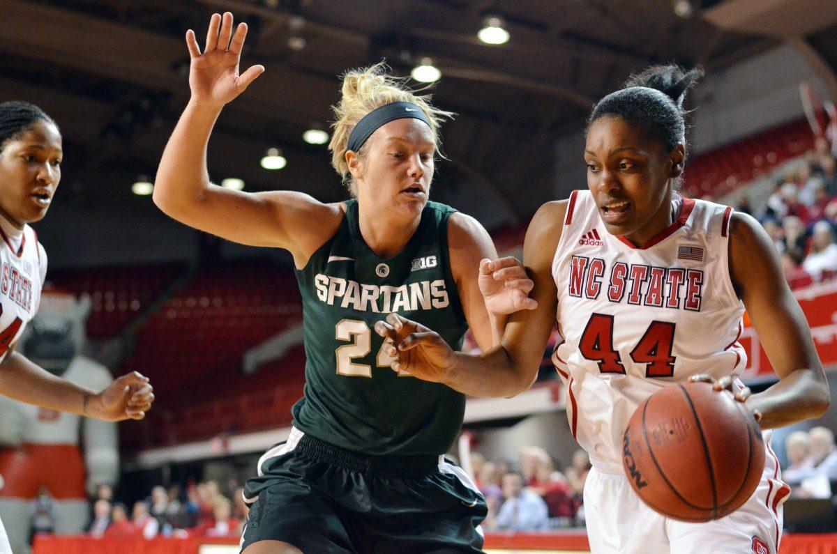 Junior forward Kody Burke drives to the net during the women's basketball game against Michigan State in the Big Ten Challenge in Reynolds Coliseum Thursday, Nov. 29, 2012. The Spartans lead the Wolfpack 39-32 at the half.&#160;