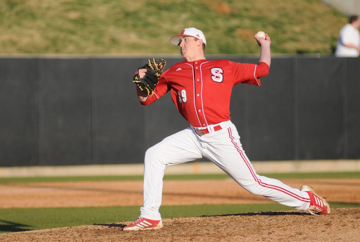 Sophomore pitcher Travis Orwig pitches against New Mexico State Wednesday, Feb. 27, 2013. Orwig pitched for four innings allowing only one run and three strikeouts in the Wolfpack's 9-2 win over the Aggies at Doak Field at Dail Park. Photo by Ryan Parry.