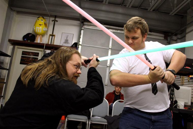 Josh Albert, 30 and Jesse Whiteside, a sophomore in computer engineering duel with lightblades showing off techniques Saturday Feb. 2, 2013 at European Medieval Arts of Arms in Cary. EMAA offers a variety of swordfighting and martial arts classes.