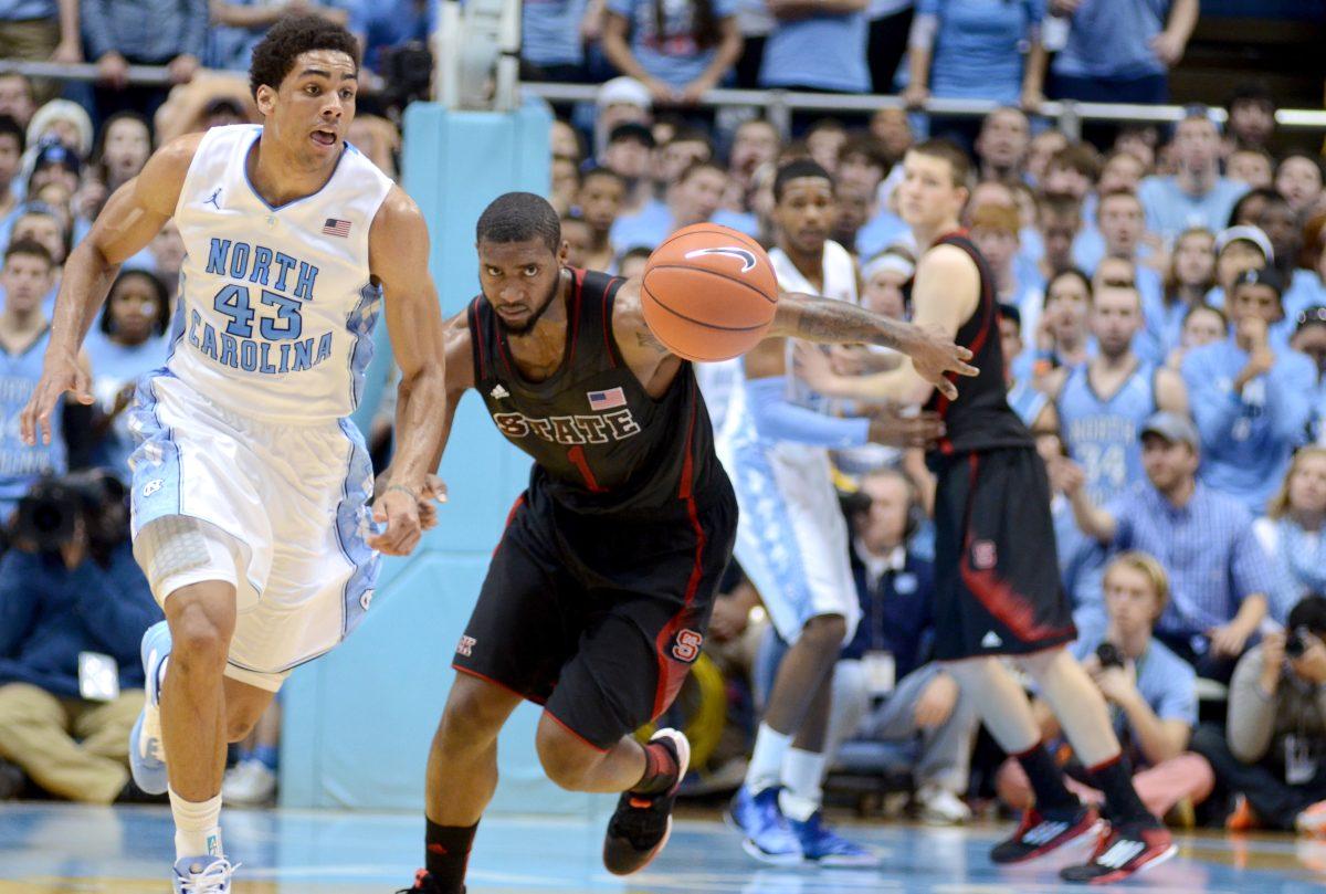 Senior forward Richard Howell races back down the court after a turnover by N.C. State during the first half of the game against North Carolina Saturday, Feb. 23, 2013. Howell had 13 points and 17 rebounds in the Wolfpack's 76-65 loss to the Tar Heels at the Dean Smith Center in Chapel Hill. Photo by Ryan Parry.