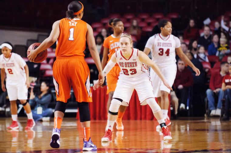 Senior guard Marissa Kastanek takes position to defend the basket during the women's basketball game against Clemson in Reynolds Coliseum Sunday, Feb. 10, 2013. The Wolfpack Women defeated the Tigers 79-45. Photo by John Joyner.