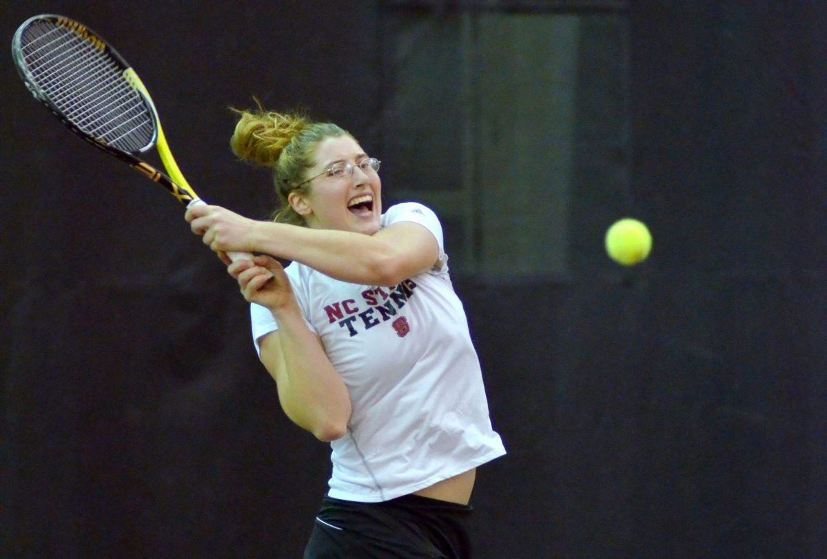 Junior Joelle Kissell returns the ball during her doubles match with senior Tatiana Illova against East Carolina Thursday, Jan. 31, 2013. Illova and Kissell lost their match 8-6 at the J.W. Isenhour Tennis Center. Photo by Ryan Parry.