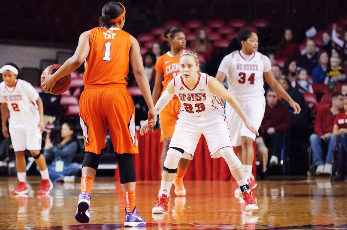 Senior guard Marissa Kastanek takes position to defend the basket during the women's basketball game against Clemson in Reynolds Coliseum Sunday, Feb. 10, 2013. The Wolfpack Women defeated the Tigers 79-45. Photo by John Joyner.