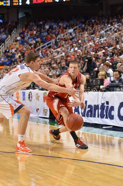 Senior forward Scott Wood passes the ball during the second game of the ACC Tournament against Virginia in Greensboro Coliseum Friday, March 15, 2013. The Wolfpack defeated the Cavaliers 75-56. Photo by John Joyner.