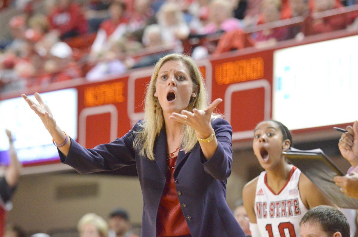 Head coach Kellie Harper expresses her discontent with an official's ruling during the last home game of the season against Virginia in Reynolds Coliseum Thursday, Feb. 28, 2013. The Wolfpack Women defeated the Lady Cavaliers 80-59. Photo by John Joyner.