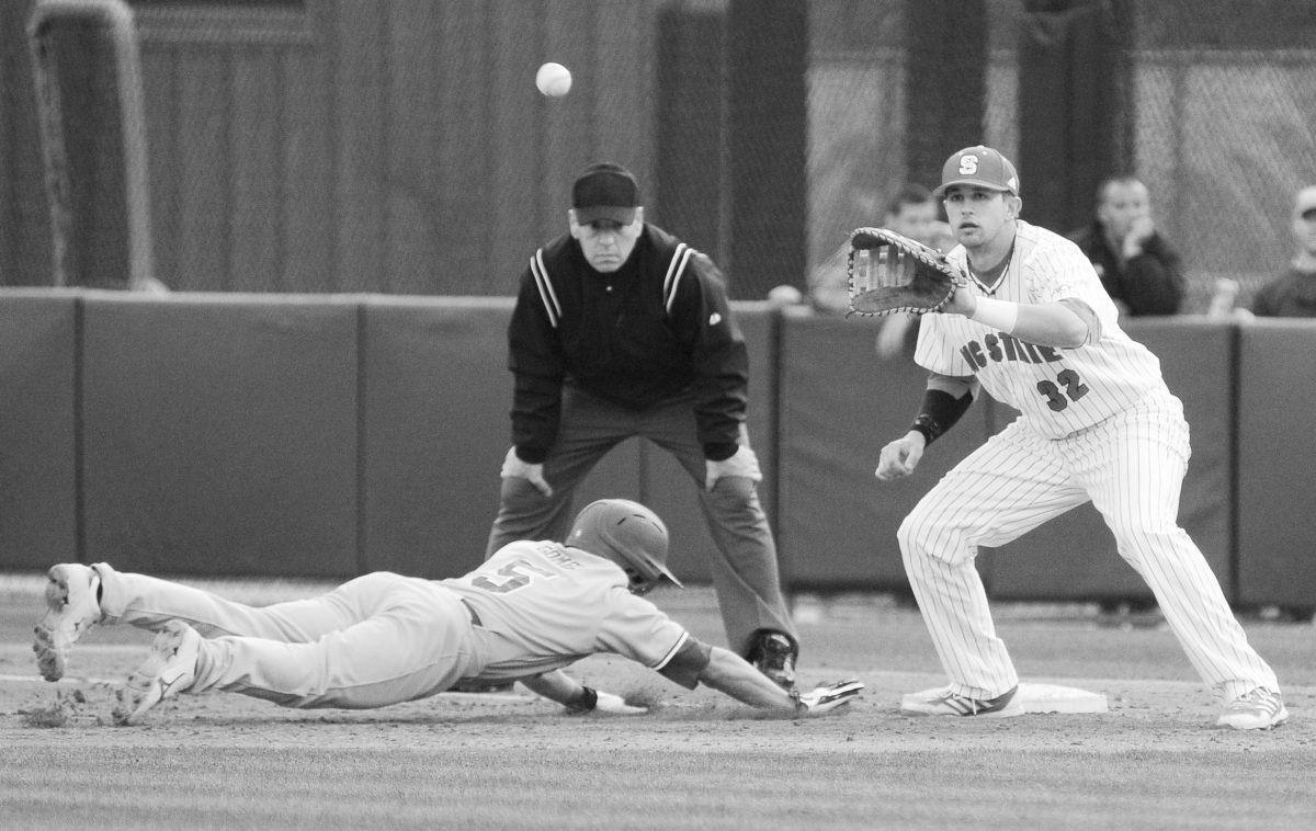 Senior first baseman Tarran Senay prepares to catch a checked pitch against Elon Wednesday, April 3, 2013. The Wolfpack led the Phoenix 8-6 at the end of the seventh inning at Doak Field at Dail Park. Photo by Ryan Parry.