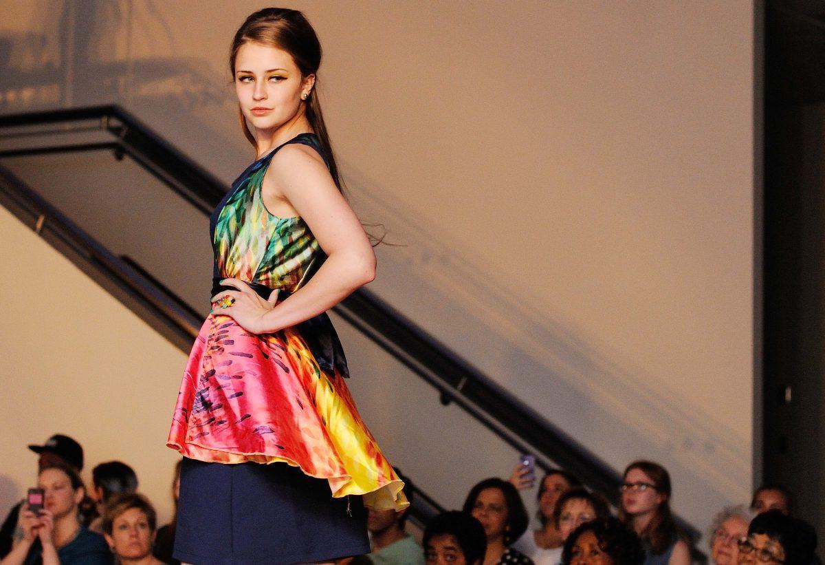 Junior in fashion and textile management Rachel Pace's collection entitled "The Unconventional Housewife" is showcased at the African American Textile Society Fashion Expose in the College of Textiles atrium Monday, April 8, 2013. Photo by Ryan Parry.