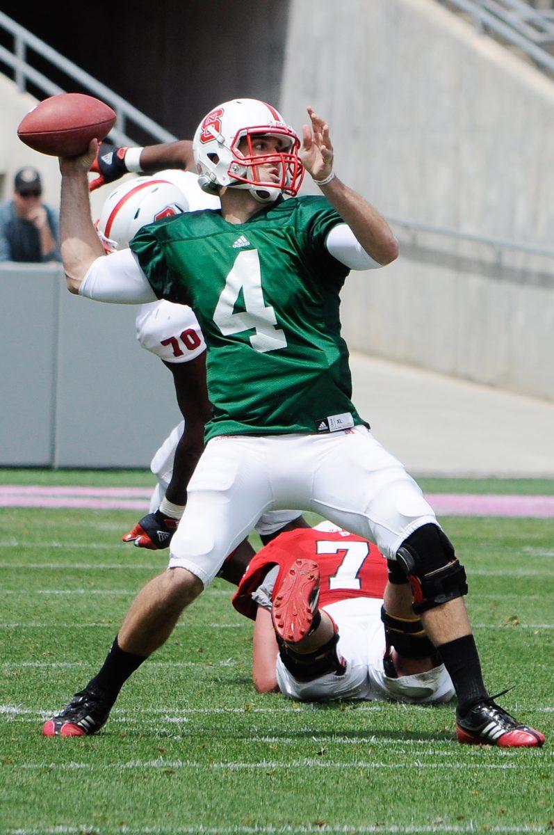 Redshirt junior Pete Thomas prepares to throw the ball Saturday April 20, 2013 at Carter-Finley Stadium during the Kay Yow spring football game. The Red team defeated the White team 20-0. Photo by Chris Rupert