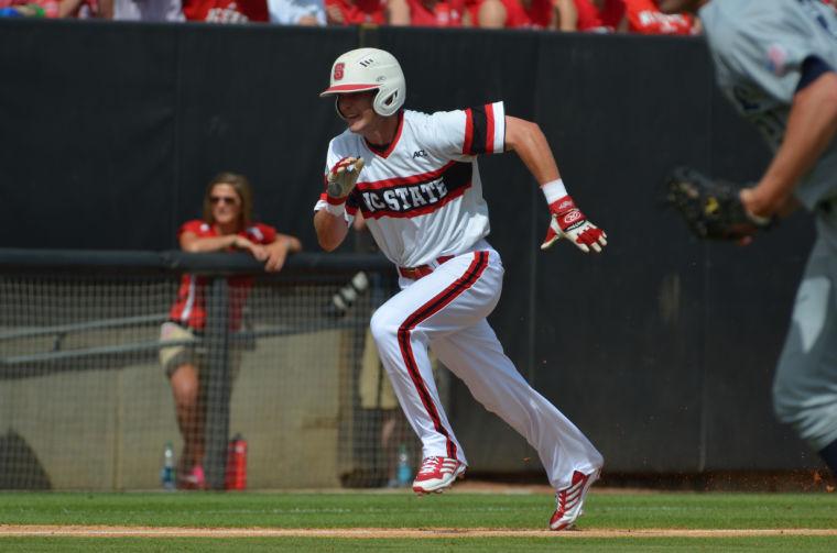 Junior right fielder Jake Fincher sprints from third to home during the first round of the Raleigh super regional against Rice on Doak Field Saturday June 8, 2013. The Wolfpack defeated the Owls, 4-3.&#160;