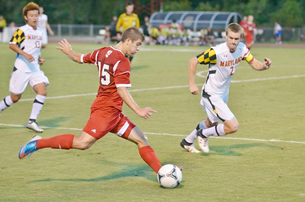 Junior midfielder Alex Martinez takes a shot during the soccer game against Maryland Friday, Sept. 14, 2012. The previously undefeated Wolfpack fell to the #1 Terps 3-2.