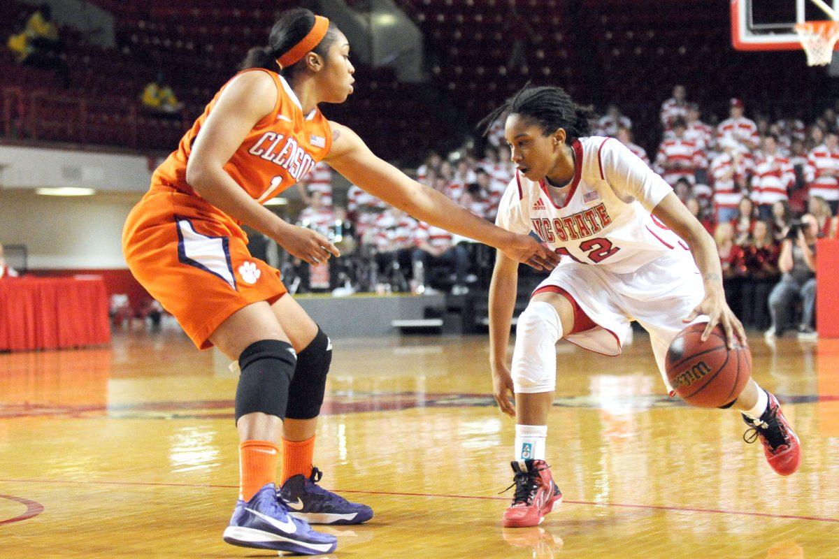 Sophomore guard Krystal Barrett looks for a path to the basket during the women's basketball game against Clemson in Reynolds Coliseum Sunday, Feb. 10, 2013. The Wolfpack Women defeated the Tigers 79-45.