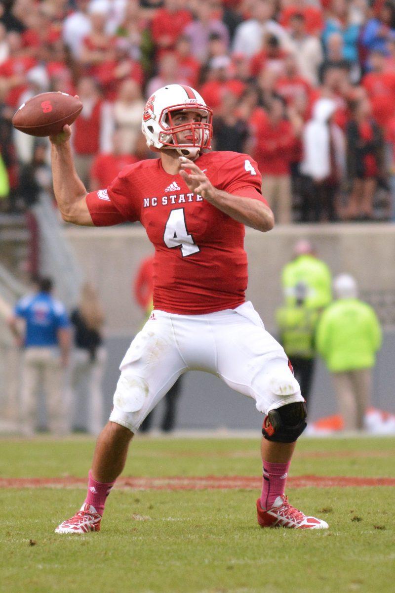 Redshirt junior quarterback Pete Thomas throws a pass during N.C. State's game against Syracuse in Carter-Finley Stadium on Saturday, Oct. 11. The Orange defeated the Wolfpack 24-10, dropping N.C. State to 0-3 in conference play. Photo by John Joyner.