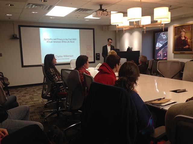 Assistant English professor John Williamson speaks about the &#8220;White Novel&#8221; on Monday.