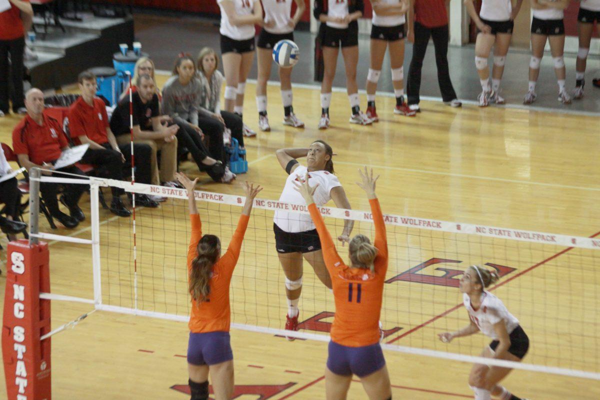 Junior outside hitter Nikki Glass spikes the ball against Clemson on Thursday. Glass had 11 kills against the Tigers, helping the Wolfpack to a straight sets win. Photo By Eric Engstrom