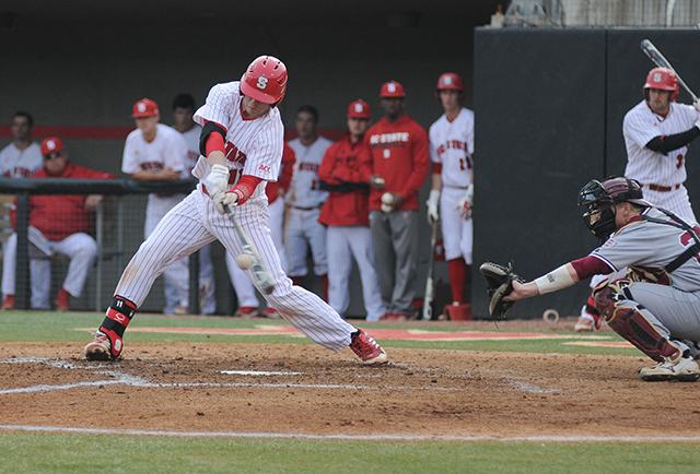 Sophomore catcher Brett Austin hits a foul ball against Elon Wednesday, April 3, 2013. The Wolfpack led the Phoenix 8-6 at the end of the seventh inning at Doak Field at Dail Park. Photo by Ryan Parry.