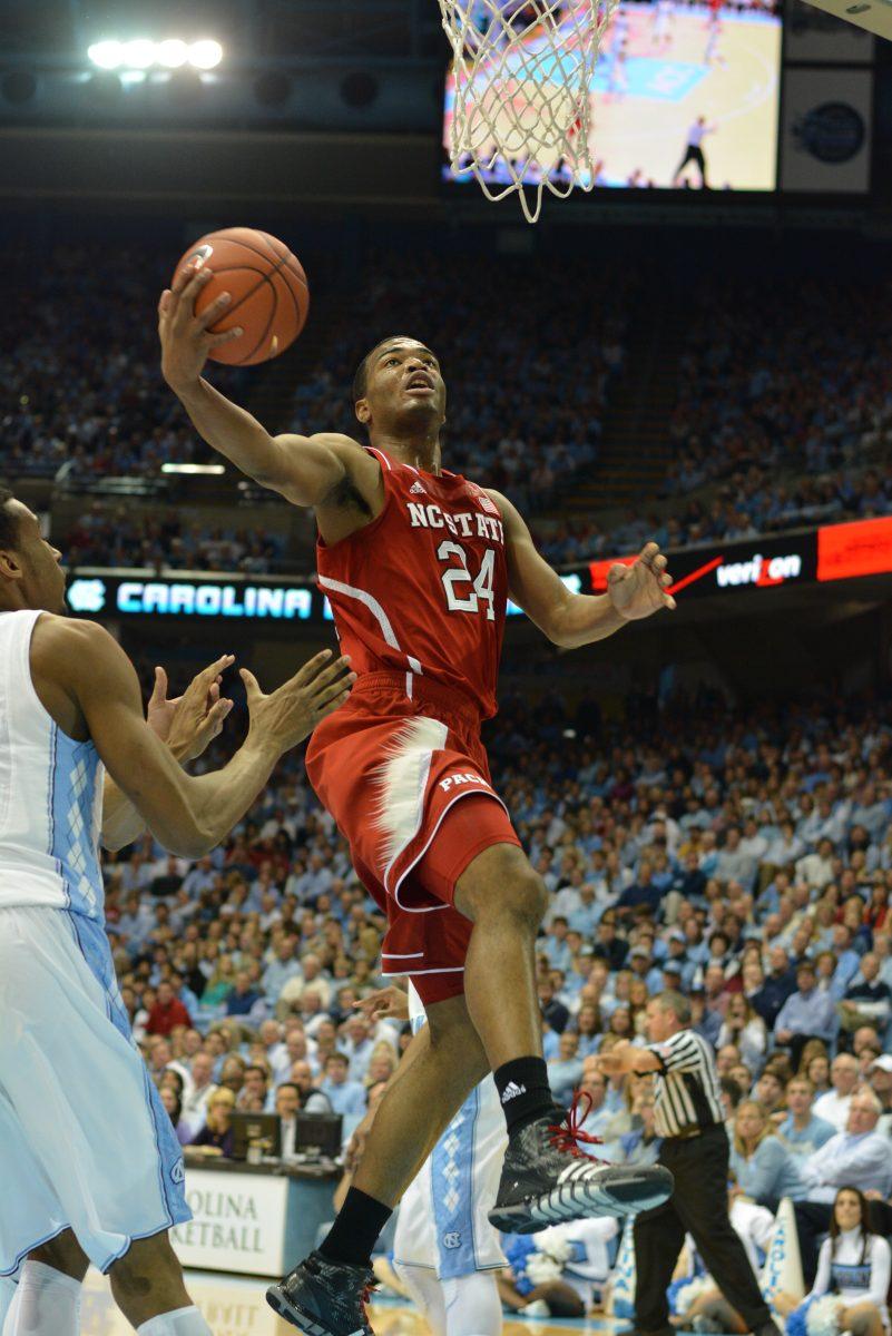 Sophomore forward T.J. Warren takes a shot against UNC Saturday, Feb. 1, 2014 at the Dean Smith Center in Chapel Hill. The Wolfpack fell to the Tar Heels 84-70 after the Wolfpack failed to recover from a 17 point deficit at the end of the first half. Photo by Chris Rupert