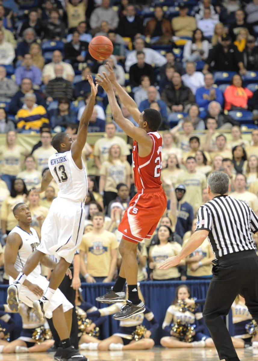 Sophomore forward T.J. Warren elevates for a jump shot in N.C. State&#8217;s game against Pittsburgh at the Petersen Events Center on Monday. Warren scored 41 points to help the Wolfpack defeat the Panthers, 74-67.
