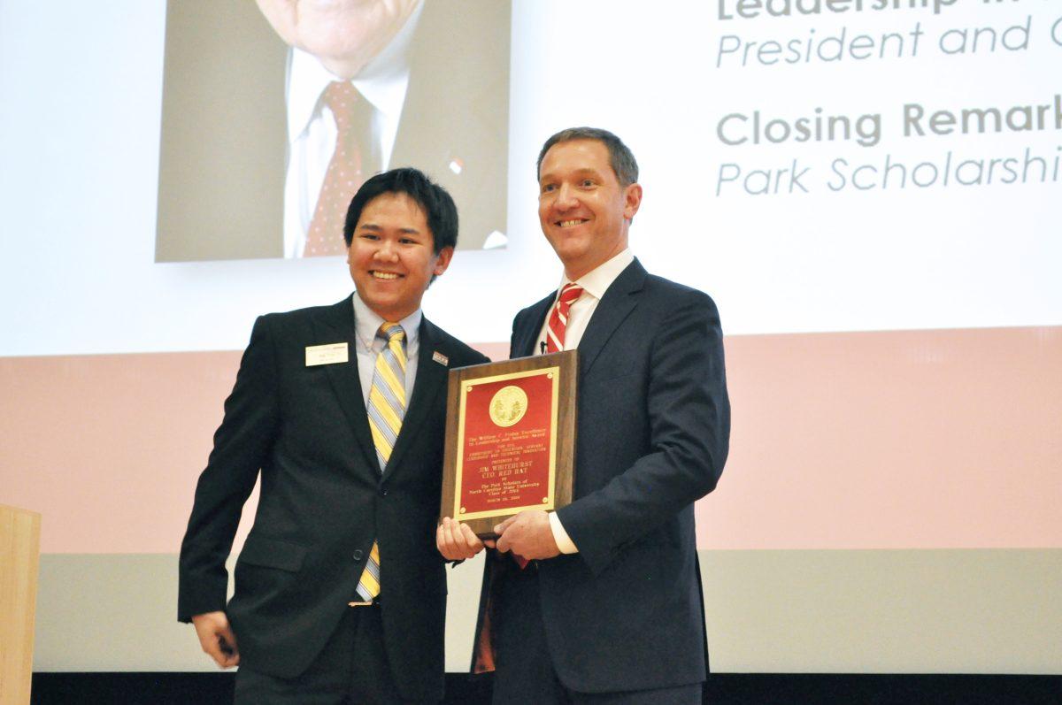 The 2014 William C. Friday Award was presented to Jim Whitehurst, President and CEO of Red Hat, Inc. Wednesday, March 26 in Hunt Auditorium. The award was presented by Park Scholar Alex Chin, a senior in mathematics. Photo by Elizabeth Davis