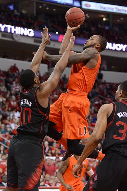 Freshman forward Lennard Freeman plays defense during the game against Miami in PNC Arena Saturday. The Wolfpack fell to the Hurricanes, 85-70.