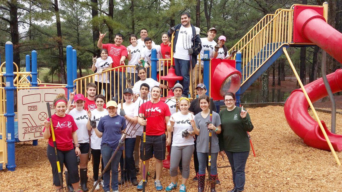 Student group gathers at park on Saturday, March 29 to landscape during Service Raleigh.&#160;