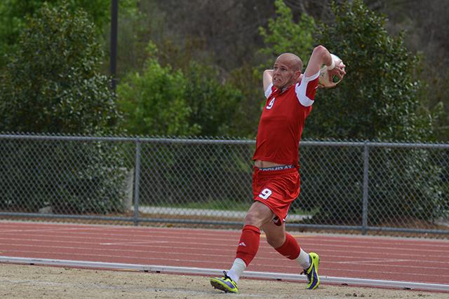 Senior forward Nick Surkamp winds up for a long throw-in in N.C. State&#8217;s spring season match against Navy at Dail Soccer Stadium Saturday afternoon.