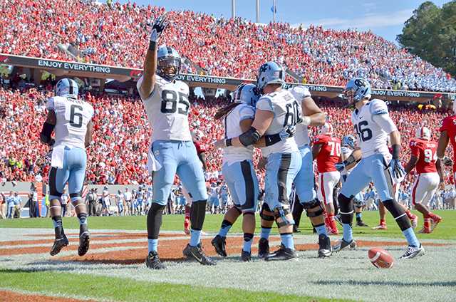 Carolina junior tight end Eric Ebron celebrates a touchdown during the homecoming football game against North Carolina in Carter-Finley Stadium Saturday, Nov. 2, 2013.