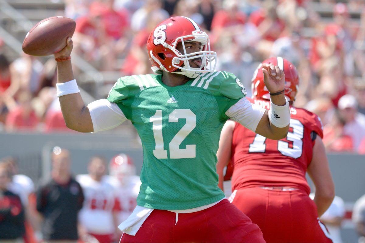 Redshirt junior quarterback Jacoby Brissett prepares to throw a pass during the Kay Yow Spring Football game in Carter-Finley Stadium Saturday, April 12, 2014.