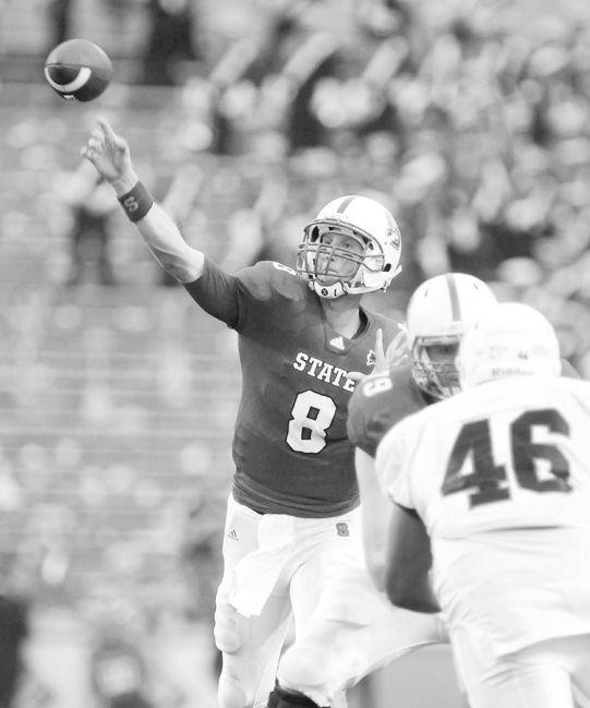 Redshirt junior quarterback Mike Glennon throws a pass during the first half of State's game against Liberty at Carter-Finley Stadium Saturday, Sept. 3, 2011. Glennon threw for 156-yards and one touchdown in the game. N.C. State won 43-21. Photo by Brent Kitchen