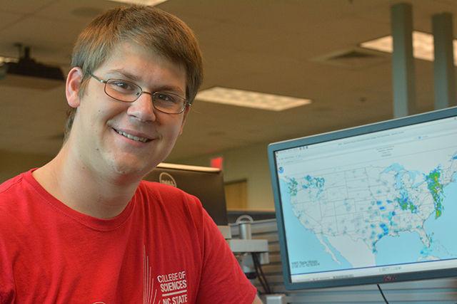 Michael Scanlan, a senior majoring in meteorology, sits with a precipitation map on a computer in the Meteorology Lab in Jordan Hall. Scanlan enjoys talking about the weather and started a blog titled MiScan 5000 in June 2013 in which he does just that. Scanlan also does weather radio broadcasting for the university. "Participating in radio broadcast encouraged me to start my blog and publicly talk about the weather. Now I can't stop relaying information to friends and family" Scanlan said.