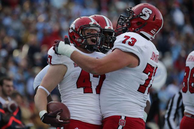 NC State returned to Chapel Hill to stomp the Tar Heels in a 35-7 beat down that featured rock solid defense from the Pack combined with an explosive rushing performance by redshirt junior quarterback Jacoby Brissett, who ran for 167 yards, breaking the school record.