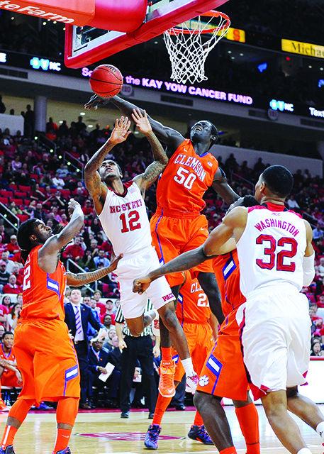 Sophomore guard Anthony 'Cat' Barber has a layup blocked during the game against Clemson Wednesday, Jan. 28, 2015. The Wolfpack were losing to the Tigers 36-16 at the half having only shot 23 percet field goals during the first half.