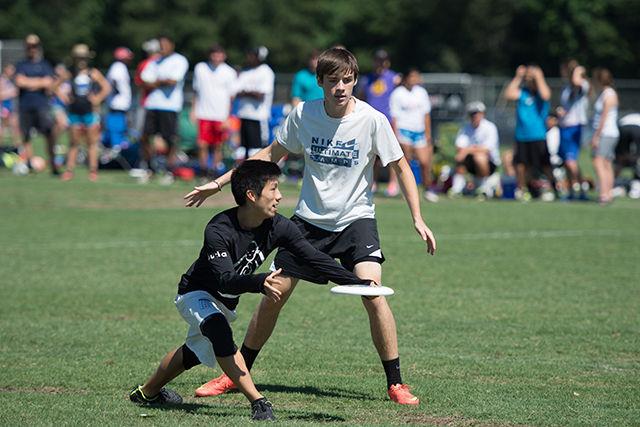 Ultimate players from team BOFA, in black, and Remy Boyz, white, compete in the Powerade State Games at WRAL Soccer Center Sunday morning. Remy Boyz defeated BOFA 13-7, which left BOFA without any wins in the tournament.