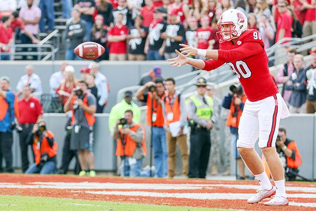 AJ Cole III punts from the NC State endzone and blasts the ball over 50 yards, giving the Tigers less than favorable field position. Cole finished the game with 5 punts for 253 total yards and an average of 50.6 yards per punt. Three of the five punts were over 50 yards. The Wolfpack fell to the Tigers 56-41 in Carter-Finley Stadium at NC State, on October 31st, 2015.