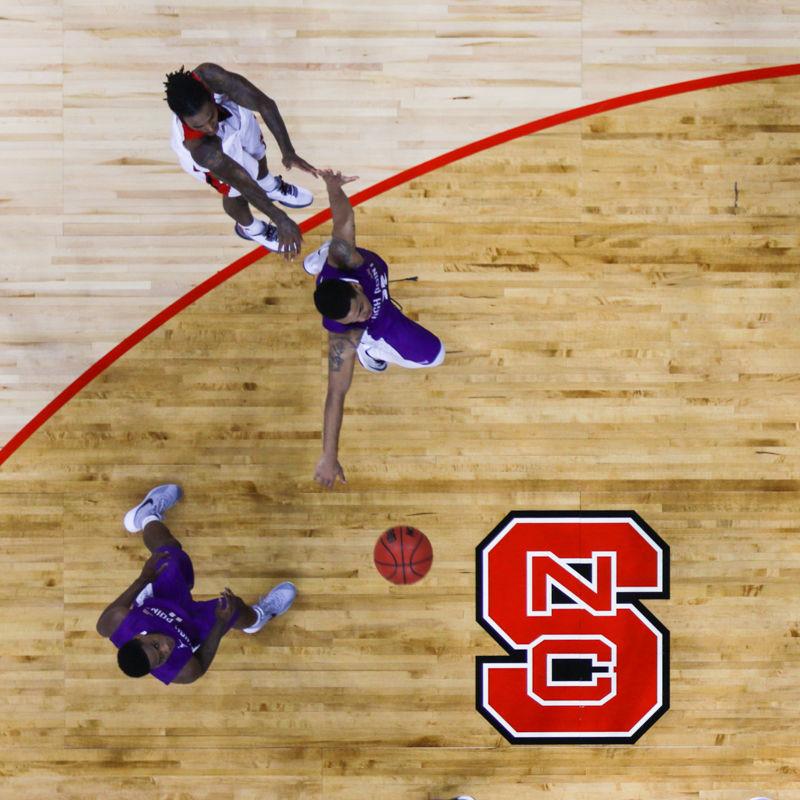 Junior guard Anthony "Cat" Barber completes a buzzer beating 3-point jumper to defeat High Point University 76-73 in PNC Arena on December 16th.